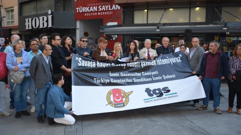 İzmirli gazeteciler, İsrail’in Filistin halkına katliam uyguladığını belirterek kınadı. Alsancak’ta
