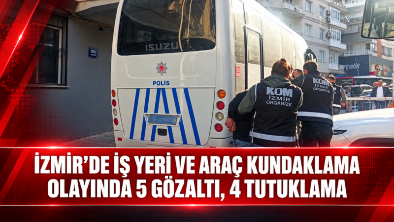 İzmir’in Konak ilçesinde bir iş yeri ile önünde park halinde
